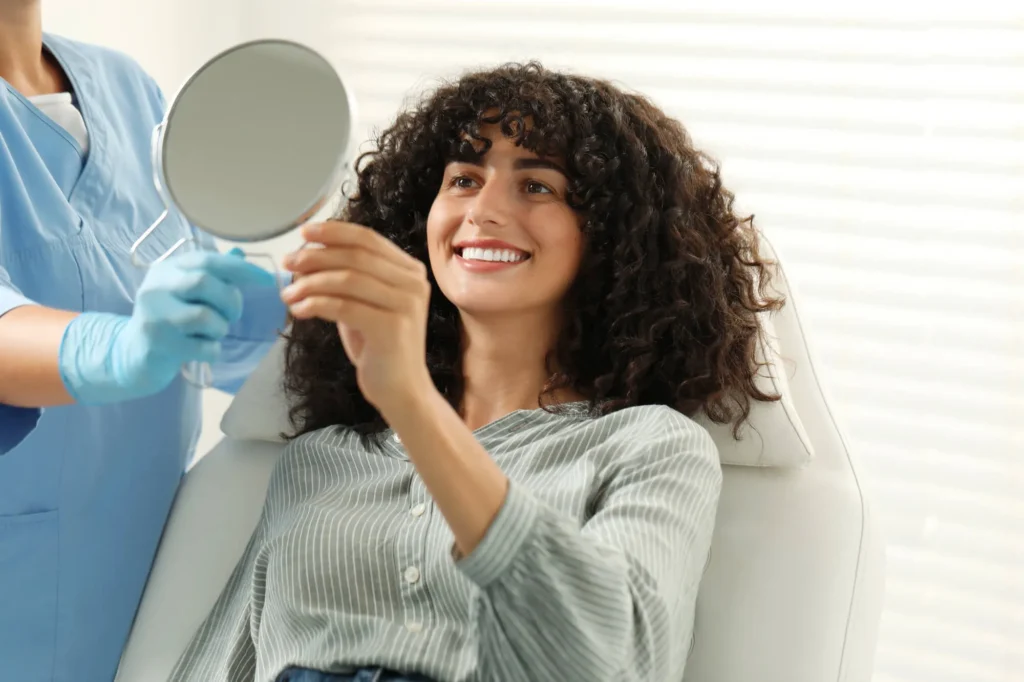 cosmetic dentist sunrise lets patient see her new smile