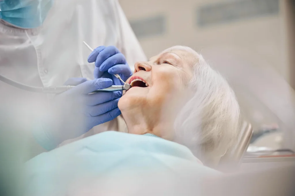 emergency dentist sunrise checking patient's teeth