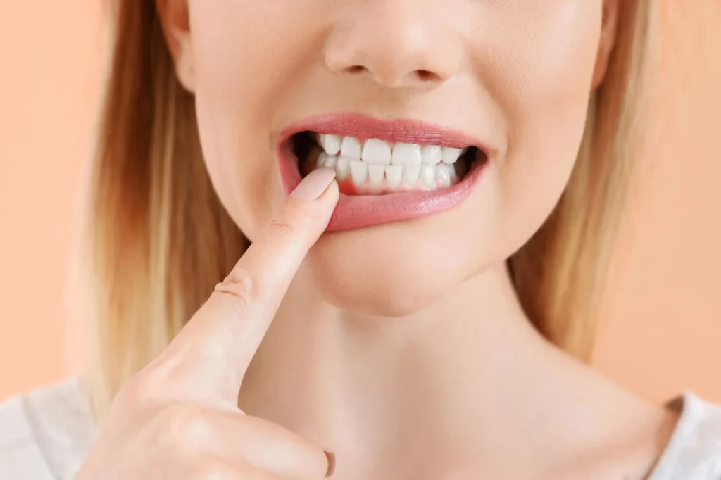 woman needs to see an emergency dentist sunrise fl