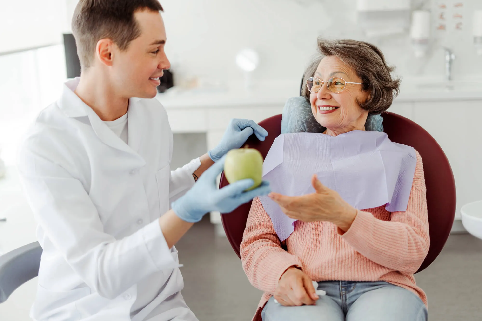 woman and dentist miramar talking