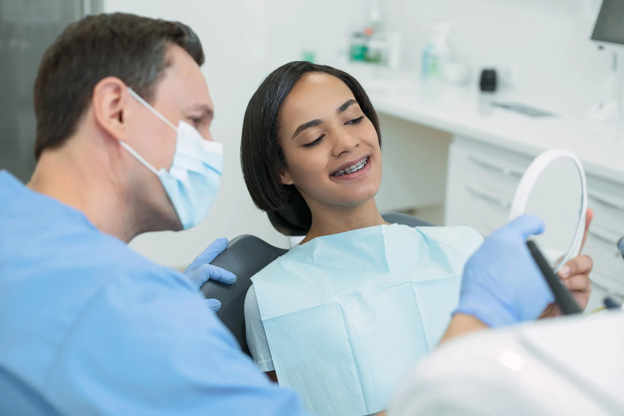 pembroke-pines-preventative-dentist-showing-patient-her-new-smile