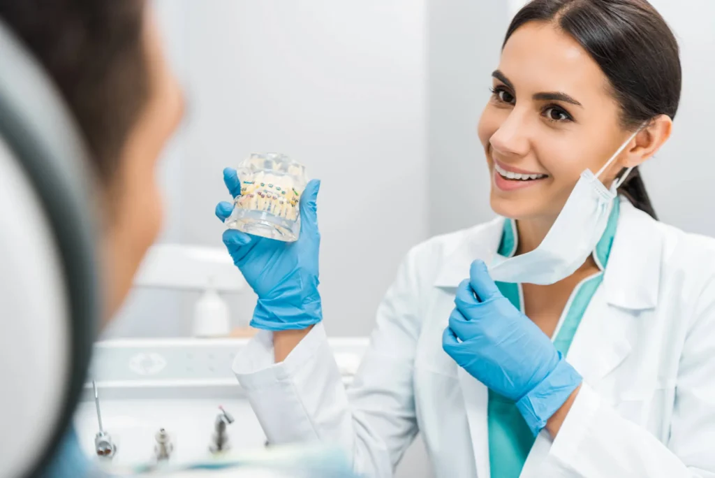 orthodontist in miramar fl explaining braces to patient