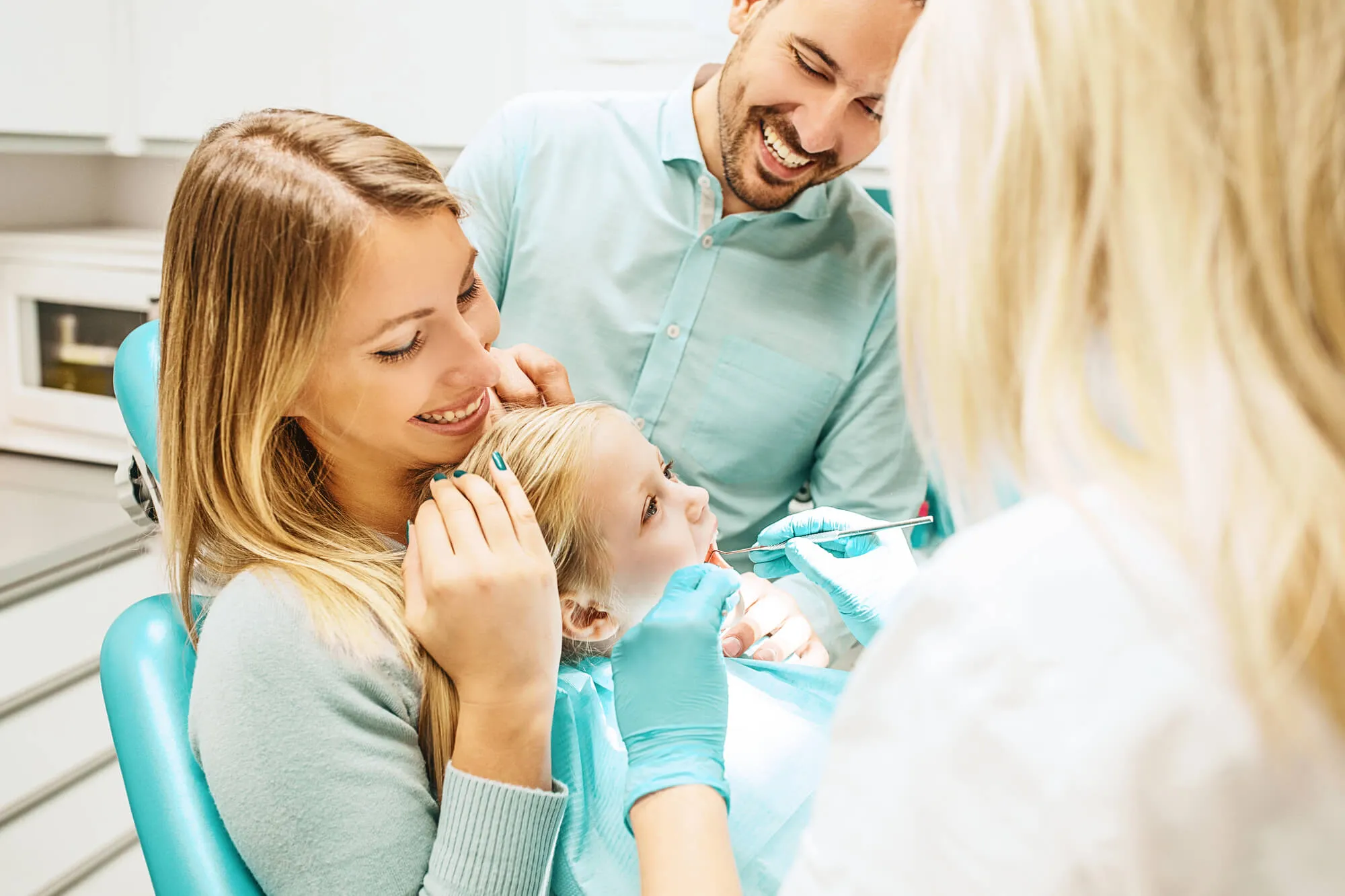 family dentist miramar examining child's teeth
